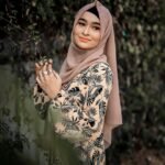 Happy female customer reviewer smiling for ZaP FeasT